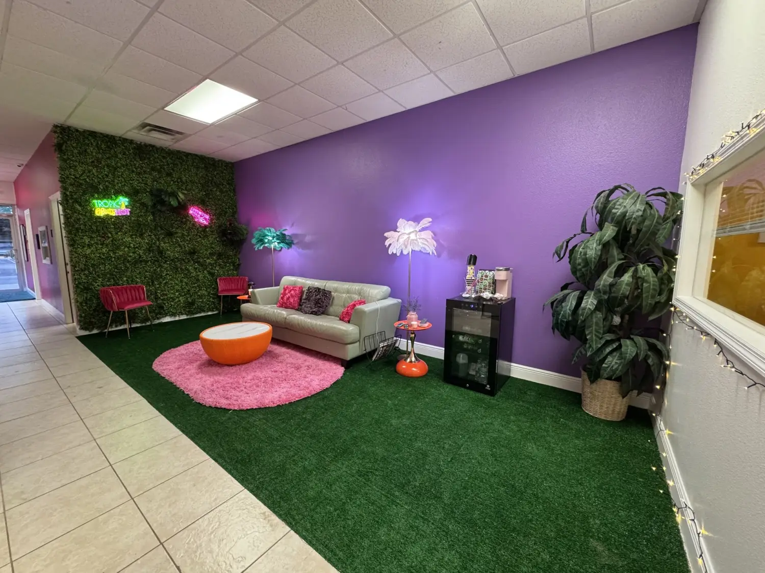 Tropical lounge with neon signs